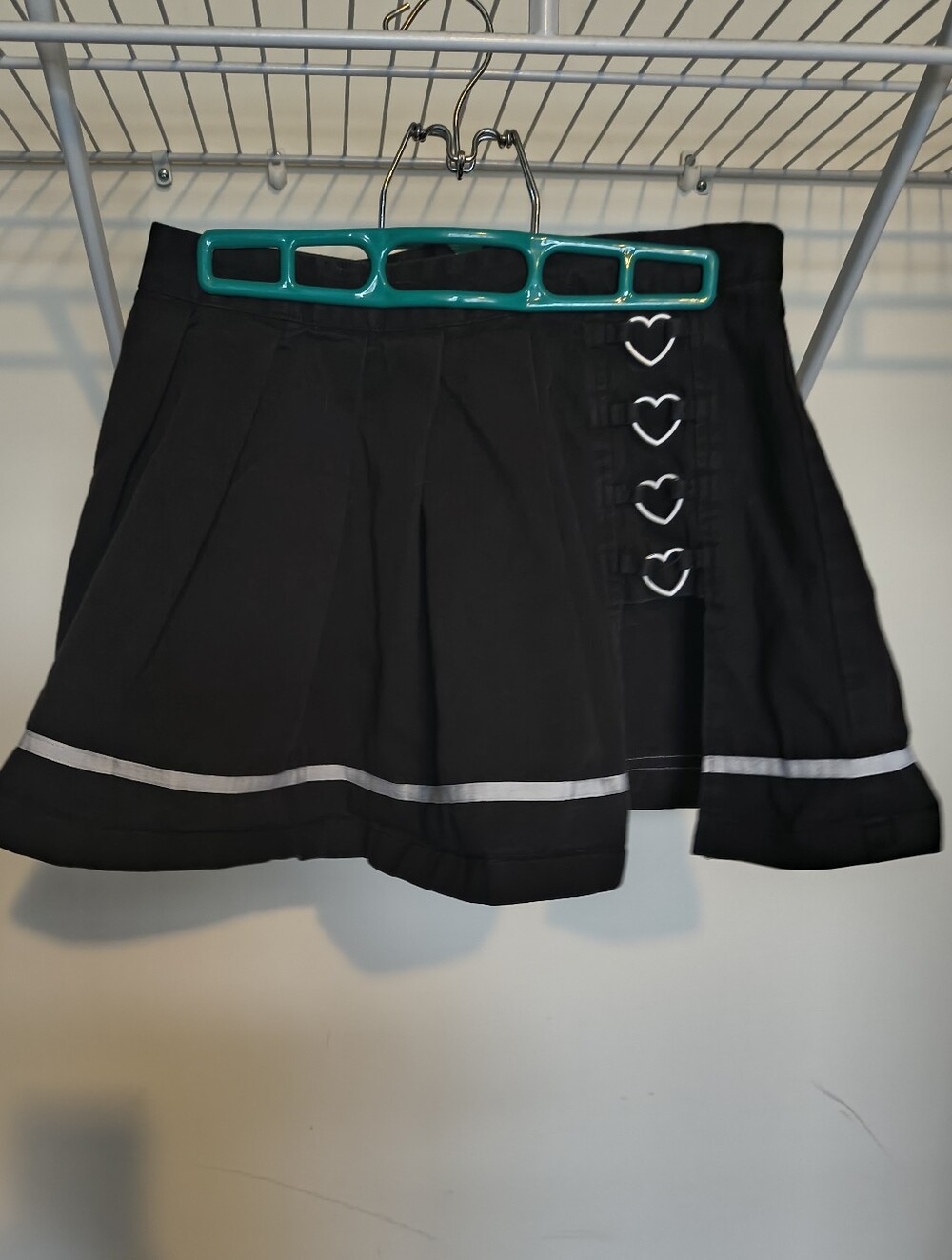 POSTER GIRL Black Pleated Mini Skirt with Heart Accent